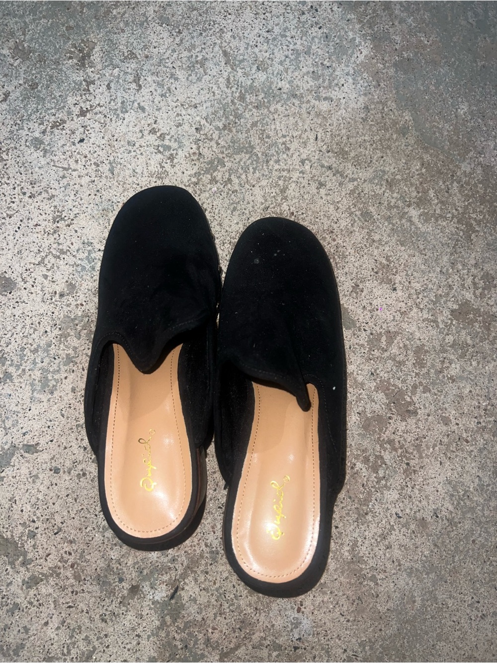 Black heeled clogs